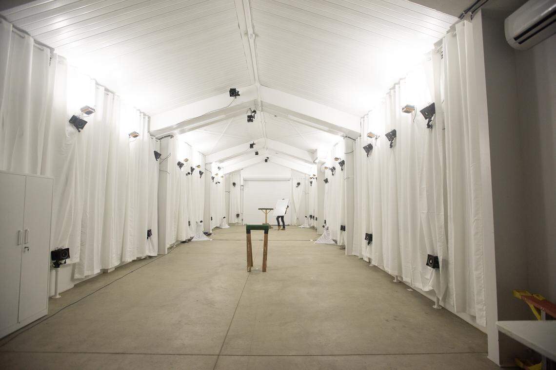 The new bird barn contains white curtains and bright lighting to mimic daylight as infrared cameras track raptors in action.