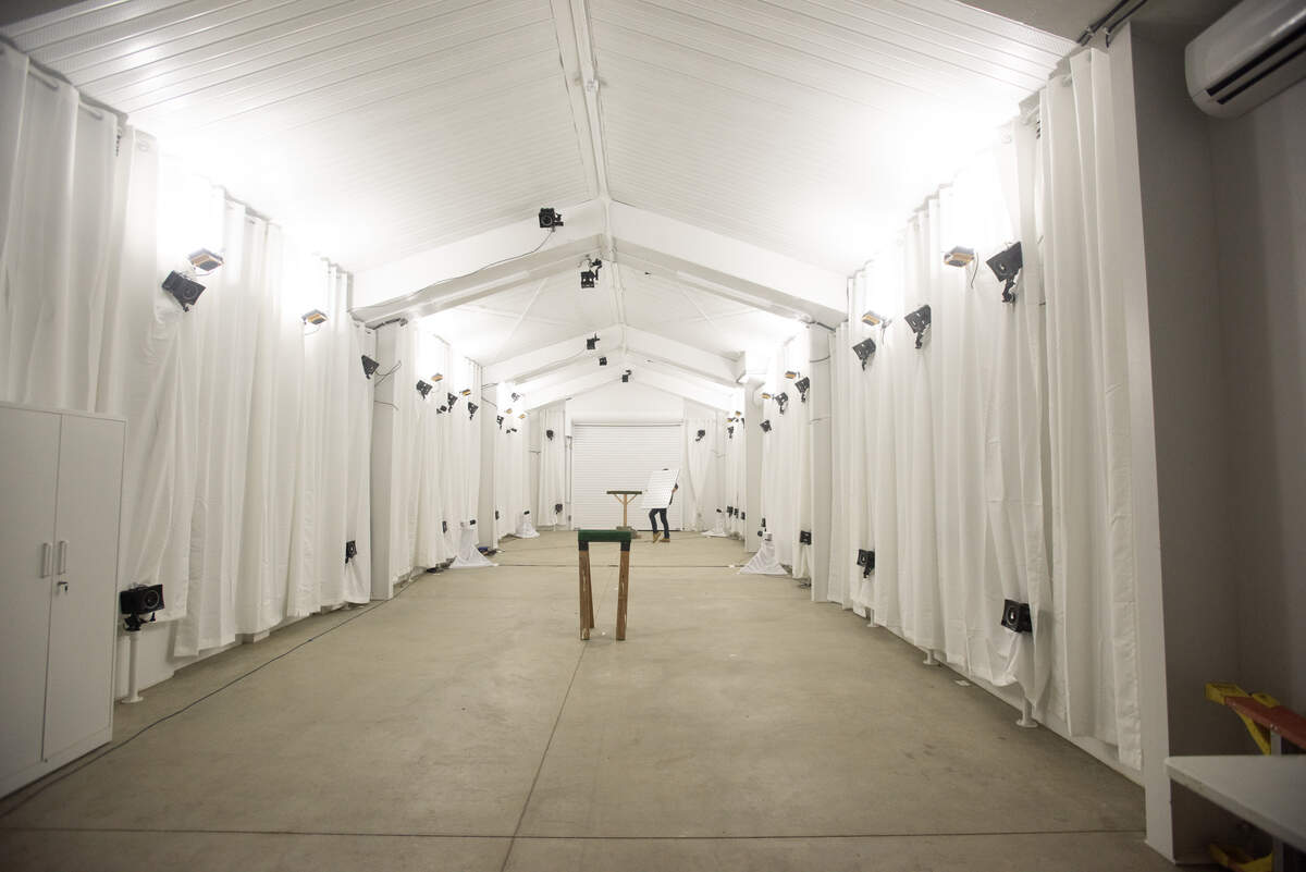 The new bird barn contains white curtains and bright lighting to mimic daylight as infrared cameras track raptors in action.
