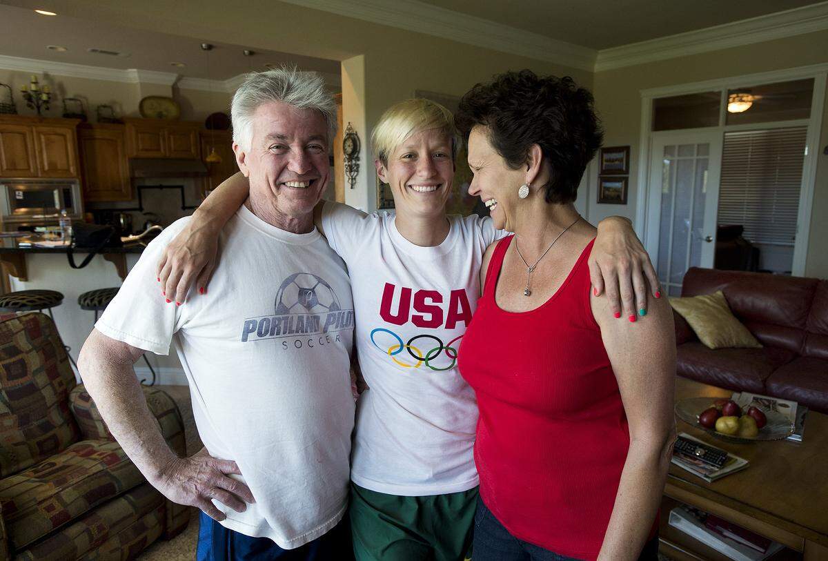 USA soccer player Megan Rapinoe visits with her parents, Jim and Denise Rapinoe, in 2012 in Redding in before appearing in the London Olympics.