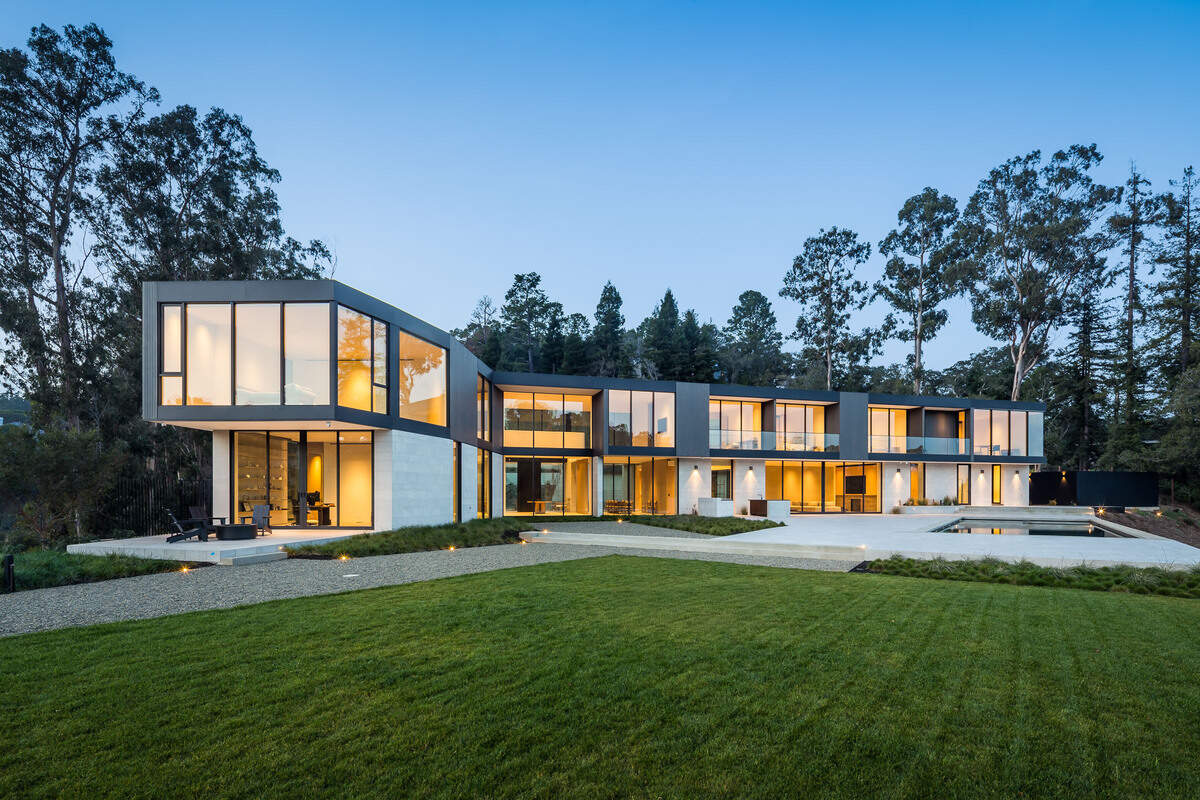 Set atop a private 2.5-acre promontory in Hillsborough with sweeping, unobstructed Bay and canyon views, the estate offers 8 bedrooms, 13 baths, and a separate ADU.