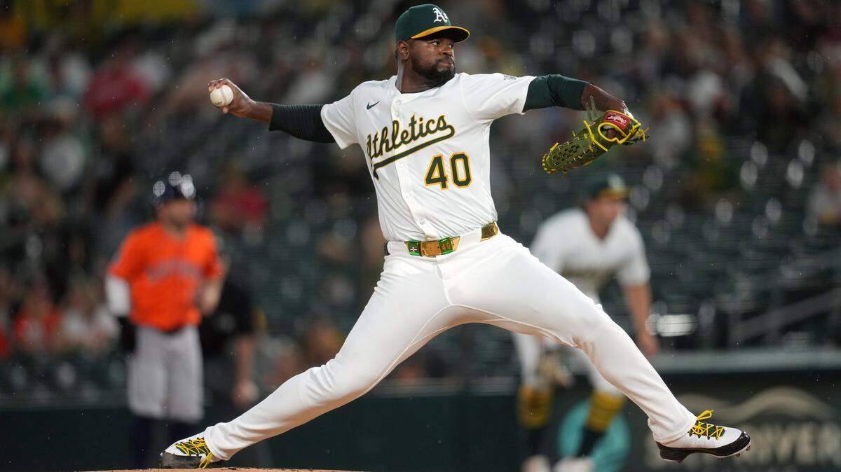 Sep 24, 2025; West Sacramento, California, USA; Athletics pitcher Luis Severino (40) delivers a pitch against the Houston Astros in the first inning at Sutter Health Park. Mandatory Credit: Cary Edmondson-Imagn Images