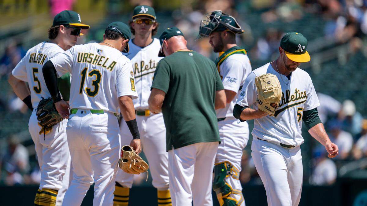 Athletics starting pitcher Jeffrey Springs walks off the mound after a pitching change by manager Mark Kotsay in the seventh inning July 13 during a game against the Toronto Blue Jays at Sutter Health Park in West Sacramento. Springs as well as starters Luis Severino and J.P. Sears have been mentioned as rumored trade pieces ahead of Thursday’s deadline.