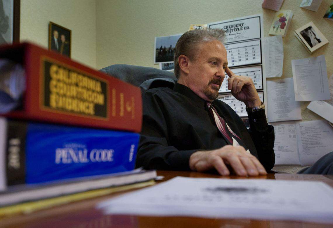 Del Norte District Attorney Jon Alexander works in his office in 2012. Recovering from methamphetamine addiction, he was removed from the office by the Board of Supervisors in 2014 after he was disbarred.