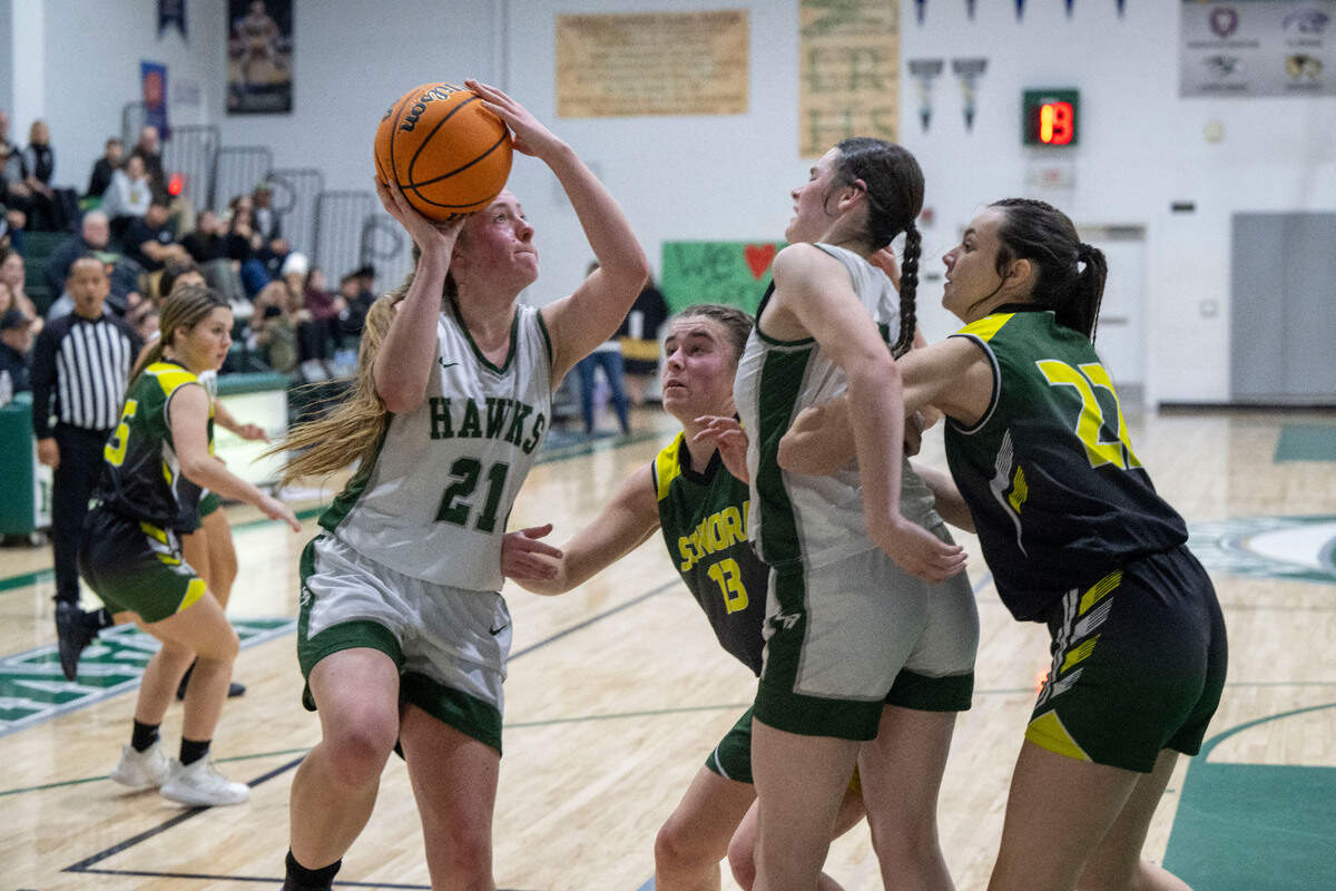 Liberty Ranch’s Haley Smith (21) looks for an opening to shoot during a CIF girls basketball playoff game against Sonora at Liberty Ranch High School in Galt on Tuesday, Feb. 13, 2024.