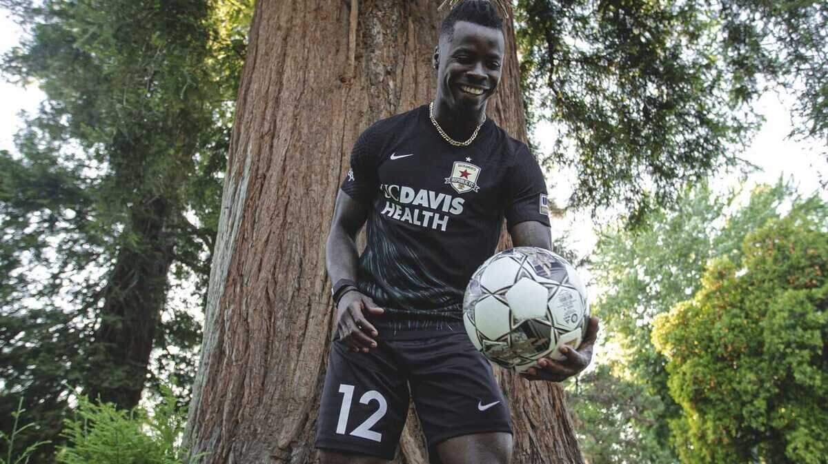 Republic FC defender Ferrety Sousa models the team’s new City of Trees kit in Sacramento.