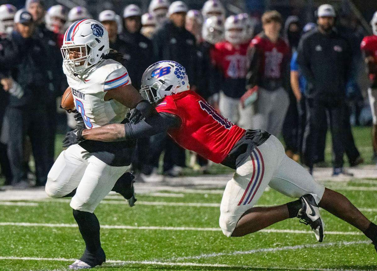 Christian Brothers Falcons linebacker Josiah Campbell (11) tackles Destiny Christian Lions running back Caleb Hill (0) in a Sac-Joaquin Section Division III quarterfinal game in November. Campbell is one of The Bee’s co-Defensive Players of the Year.