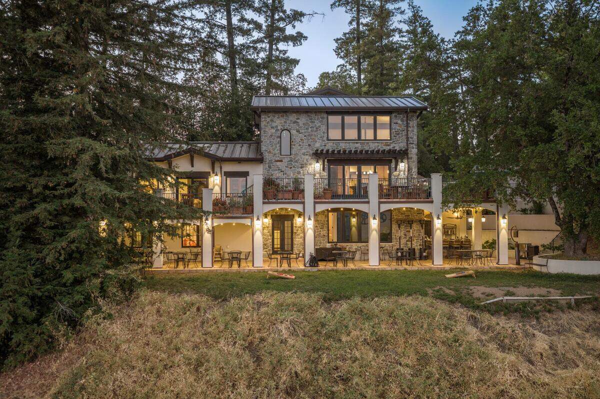 The main home, a mix of Old World style and modern design, spans 3,000 square feet with four bedrooms and four bathrooms.