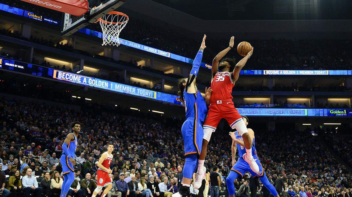 Sacramento Kings forward Marvin Bagley III (35) shoots over Oklahoma City Thunder center Steven Adams (12) during a game at Golden 1 Center on Wednesday, December 11, 2019 in Sacramento.