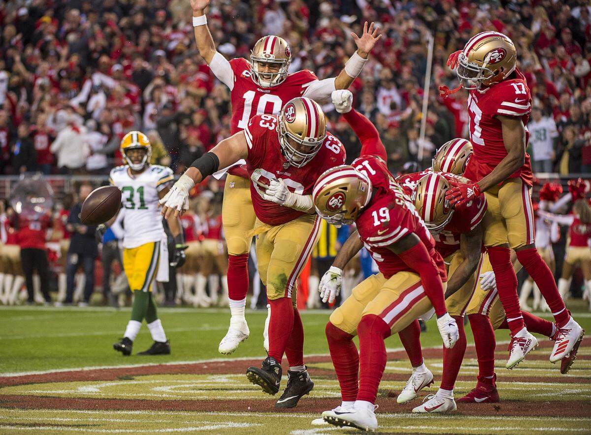 San Francisco 49ers offensive guard Ben Garland (63) spikes the ball after a touchdown by running back Raheem Mostert (31) in the second quarter during the NFC Championship at Levi’s Stadium on Sunday, Jan. 19, 2020 in Santa Clara.