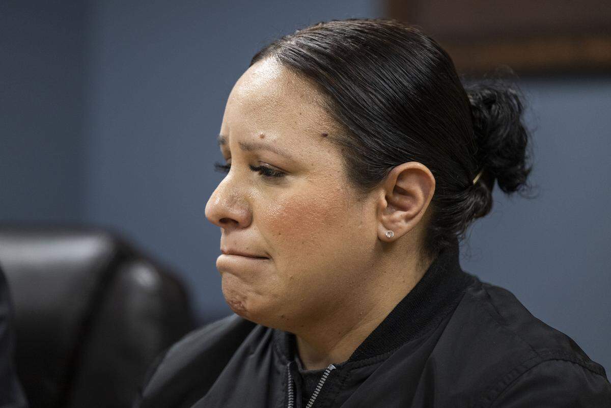 Cindy, the fiancee of Carlos Ivan Mendoza Hernandez — who was shot by ICE officers during a stop in Patterson, listens to questions from the media at their attorney's office in Modesto on Wednesday, April 8, 2026.
