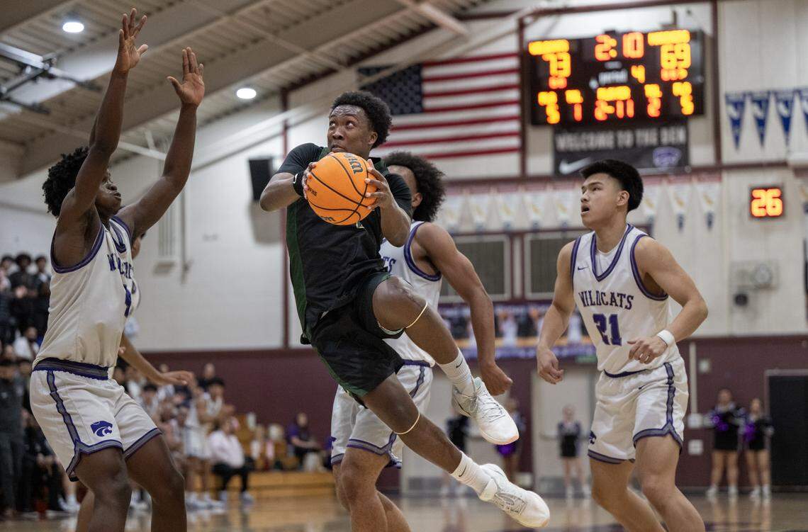 The Moreau Catholic Mariners’ Isaiah Clendinen drives to the basket in the second half against the Franklin Wildcats on Tuesday during the CIF Northern California Regional Division I boys basketball opener in Elk Grove.