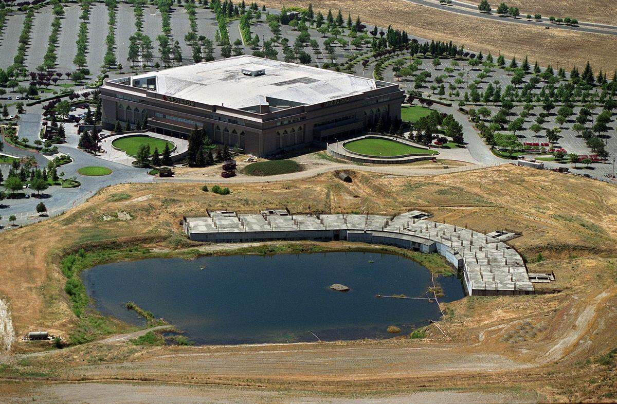 Water pools in the foundation of an unfinished professional baseball stadium next to Arco Arena in Sacramento in 2001. 