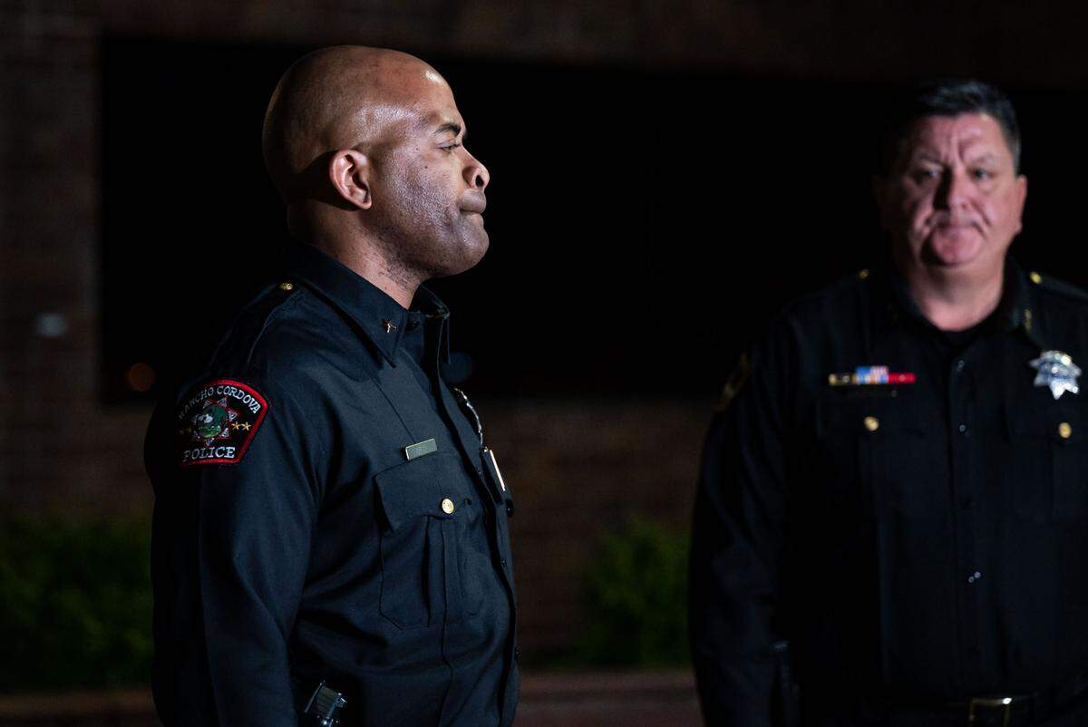 Rancho Cordova Police Chief Brandon Luke, left, and Sacramento Sheriff’s Chief Deputy Jim Barnes pause for questions after they announced the arrest of Mikilo Morgan Rawls, 37, during a press conference Friday, Feb. 11, 2022, outside the Sacramento Sheriff’s Office headquarters in Carmichael. They said he was arrested after DNA evidence linked him to the sexual assault and murder of Emma Roark, 20, earlier this year along the American River Parkway in Rancho Cordova.