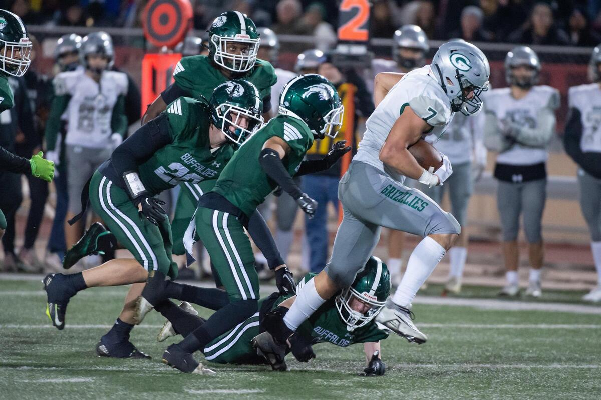 Granite Bay junior running back Frank Cusano (7) rushes for 17 yards during the third quarter in the CIF Sac-Joaquin Section Division II championship game Saturday, Nov. 26, 2022, at Hughes Stadium at Sacramento City College. The Buffaloes won 51-48.