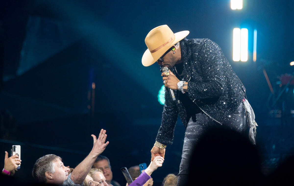 Country singer-songwriter&nbsp;Jimmie Allen greets fans while performing at Golden 1 Center in Sacramento on Tuesday night.