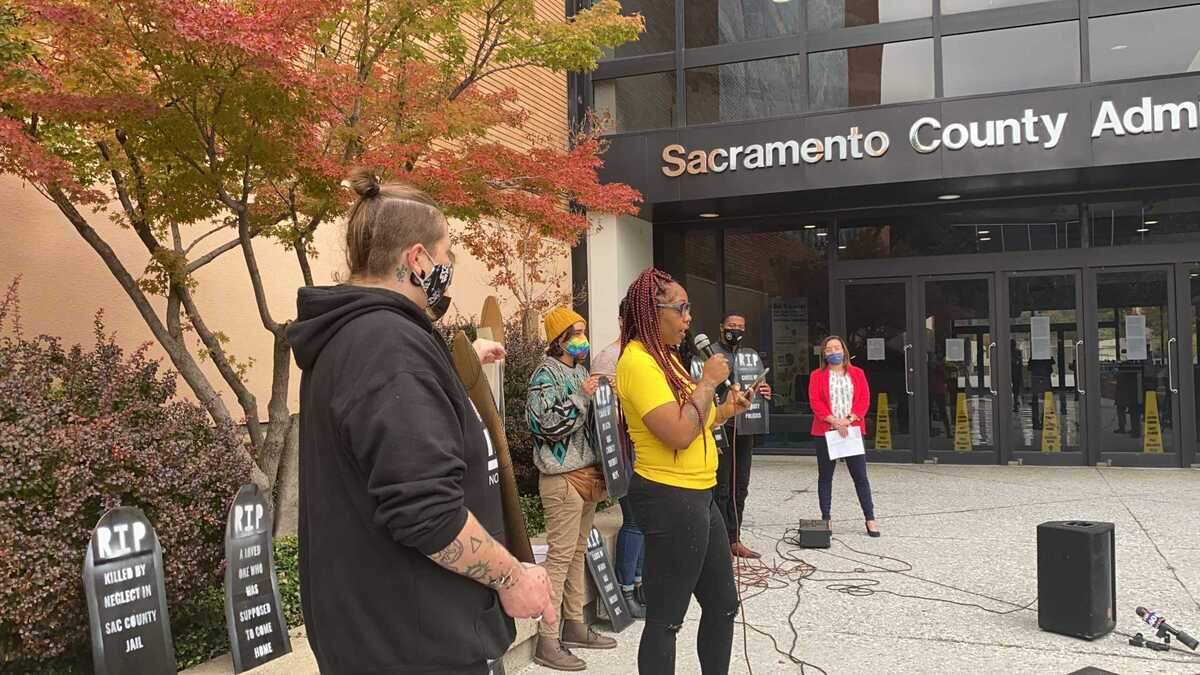 Jael Barnes of the activist group Decarcerate Sacramento on Tuesday Nov. 2, 2021, speaks to reporters about a recent COVID-19 outbreak at the Sacramento County Jail.
