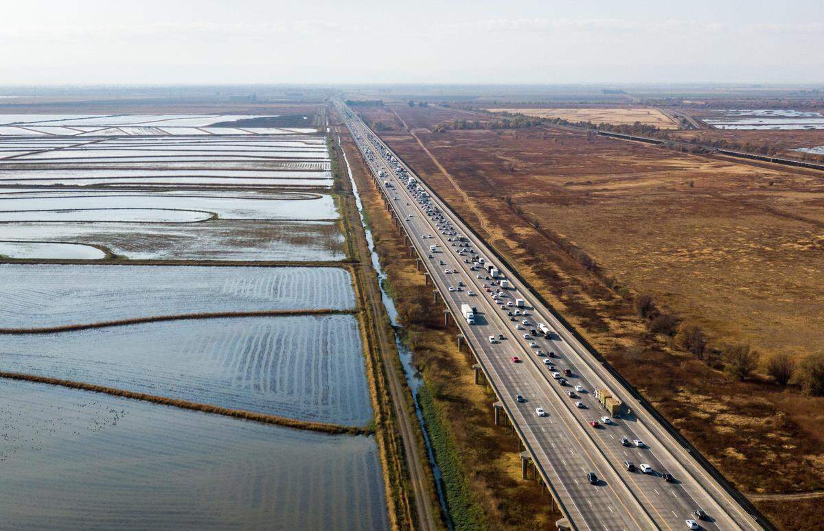 Westbound traffic on Interstate 80 slows down on the Yolo Causeway in 2019.