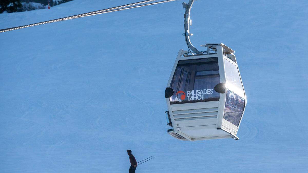 A skier finishes a run near the gondola at Palisades Tahoe in Placer County on Thursday, Jan. 11, 2024, the day after a skier died after an avalanche on a nearby run at the resort.