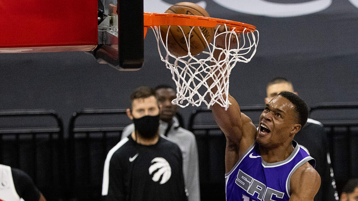 Sacramento Kings forward Robert Woodard II (13) dunks the ball during a game at the Golden 1 Center on Friday, Jan 8, 2021 in Sacramento.
