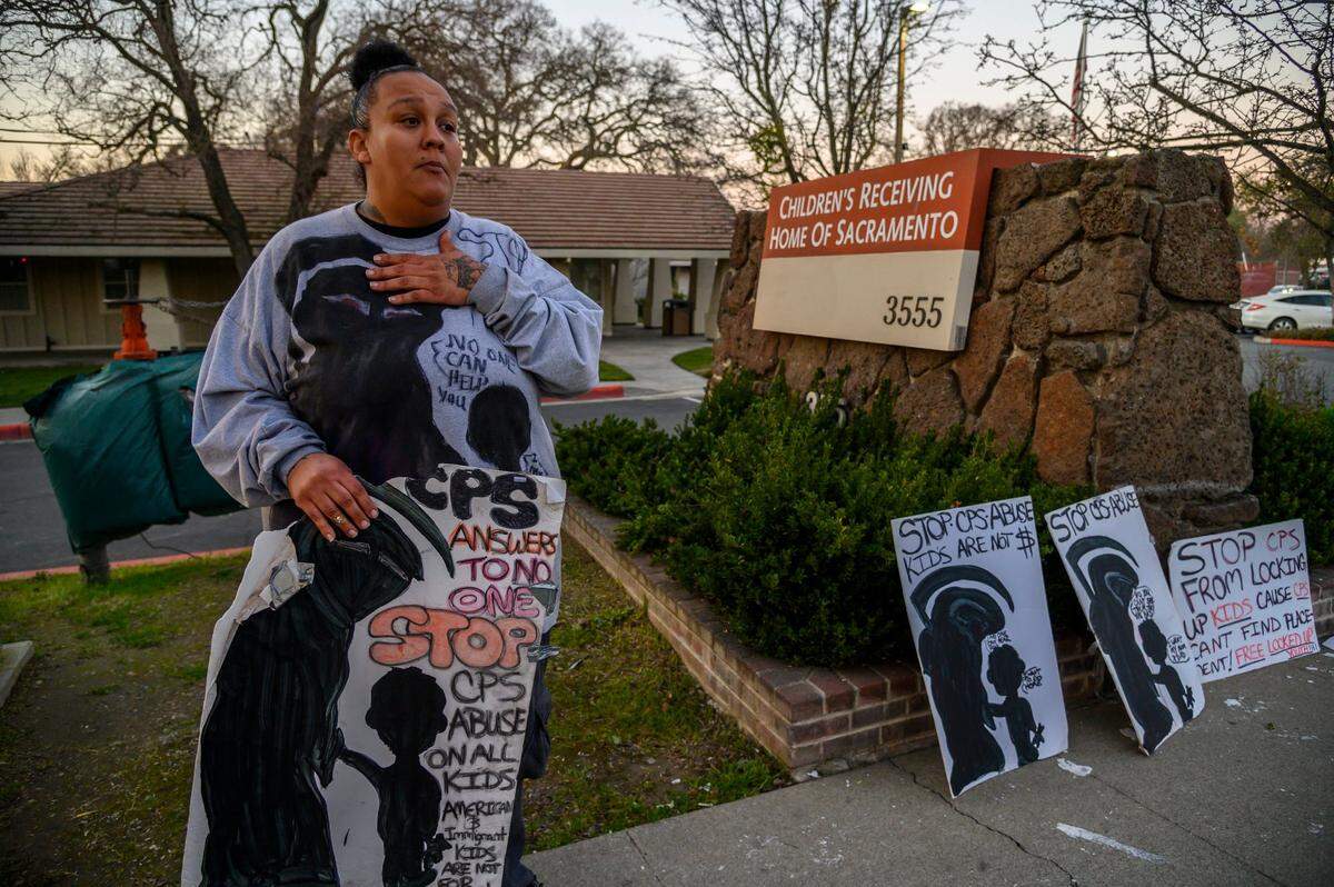Felicia Clark protests outside the Children’s Receiving Home in Sacramento in January, after Kendra Czekaj, 12, died chasing a resident that left the county’s foster care placement facility on the Auburn Boulevard campus. Clark became a frequent protester at the home after her four children were placed there. I’m standing out here for Kendra, she said.
