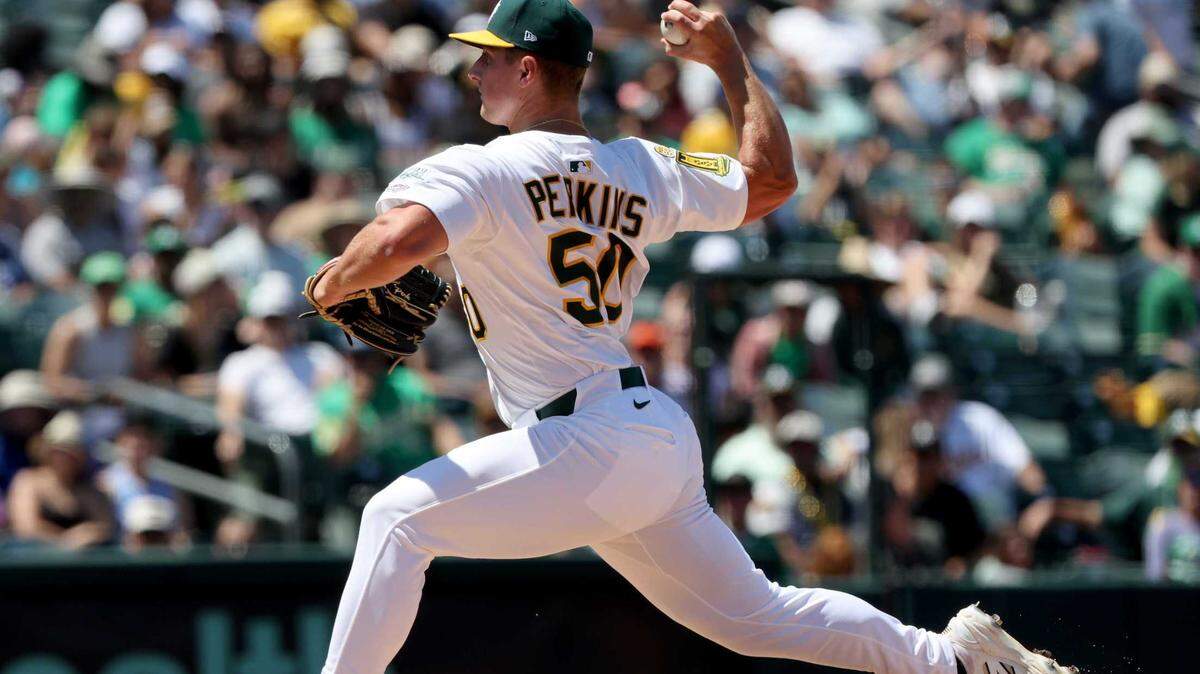 Jack Perkins pitches for the Athletics during the seventh inning of Sunday’s game against the Cleveland Guardians at Sutter Health Park in West Sacramento.