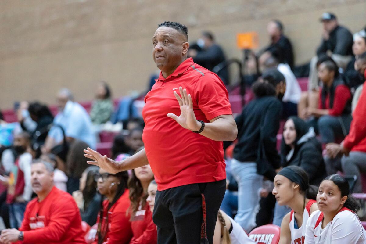 Antelope Titans head coach Sean Chambers tells his team to calm down during the first quarter at the CIF Northern California Division II round two playoff game on Thursday, March 3, 2022, at Antelope High School. The Titans won 60-58.