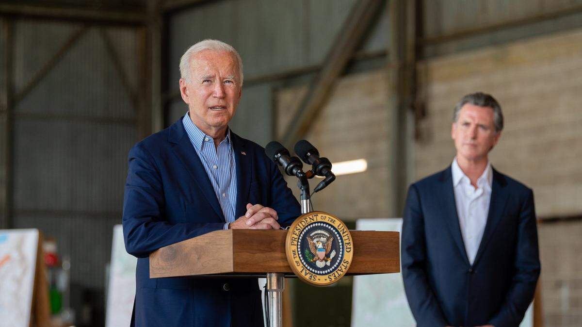 President Joseph Biden and Gov. Gavin Newsom appear at a press conference together at Sacramento Mather Airport in 2021 to address wildfires and  the investments the president is proposing to improve the nation’s resilience to climate change and extreme weather events.