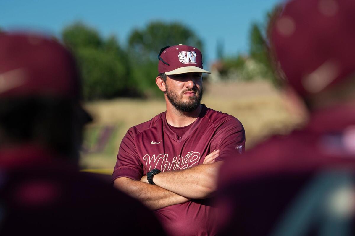 Whitney coach Jackson Watt talks with the team after Game 1 of the CIF Sac-Joaquin Section Division I baseball semifinals against the St. Mary’s Rams in 2023.