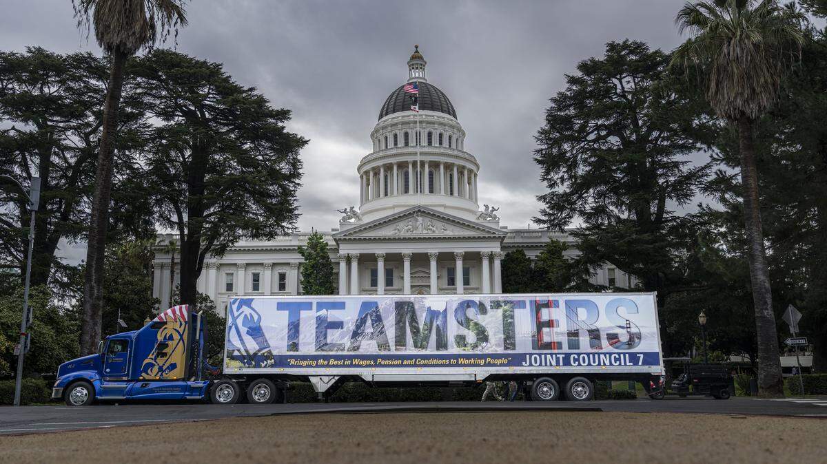 A Teamsters semi-truck is parked in front of the state Capitol as they lobby legislators on Wednesday, Feb. 11, 2026.