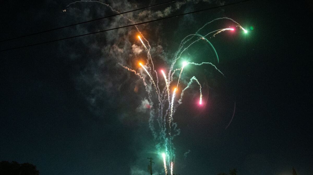 Illegal fireworks explode in the sky above a residential area on Friday, July 5, 2024, in Sacramento. Sacramento Fire Department spokesman Justin Sylvia said fines for use of illegal fireworks start at $1,000 and can go up to $5,000.