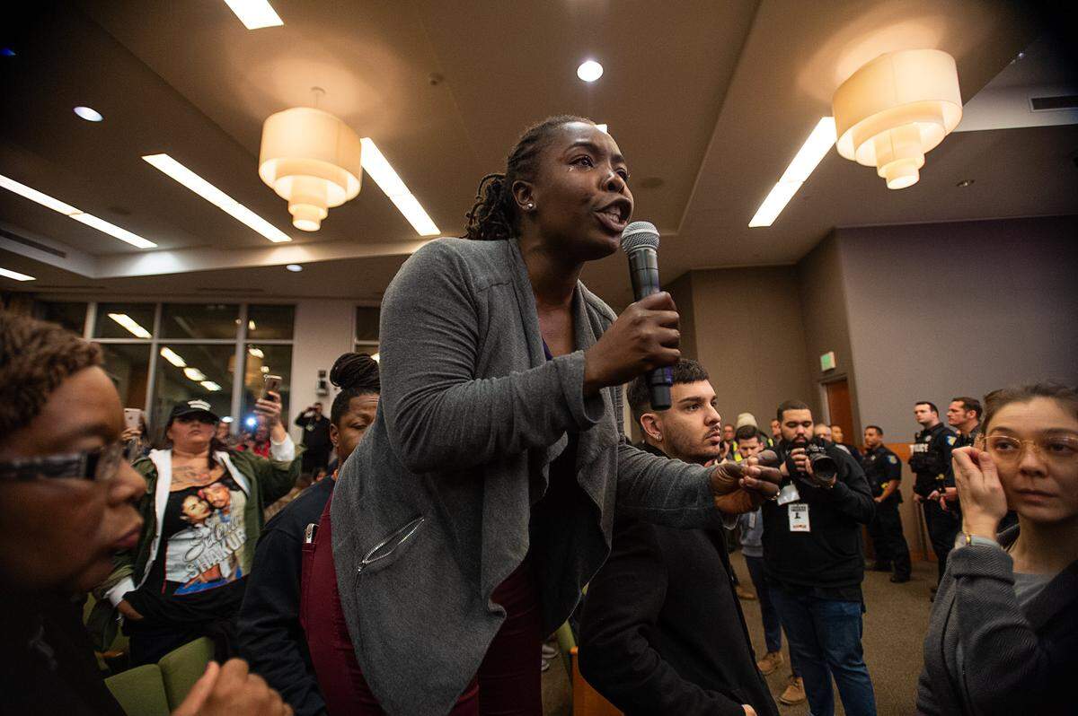 Flojuane Cofer expresses her anger about how the police handled a Stephon Clark protest during a disruption of a Sacramento City Council meeting in 2019. “This is about hearing the righteous indignation of an entire community,” she said. More than 80 people were arrested the night before during a protest Cofer had helped organize and attended.