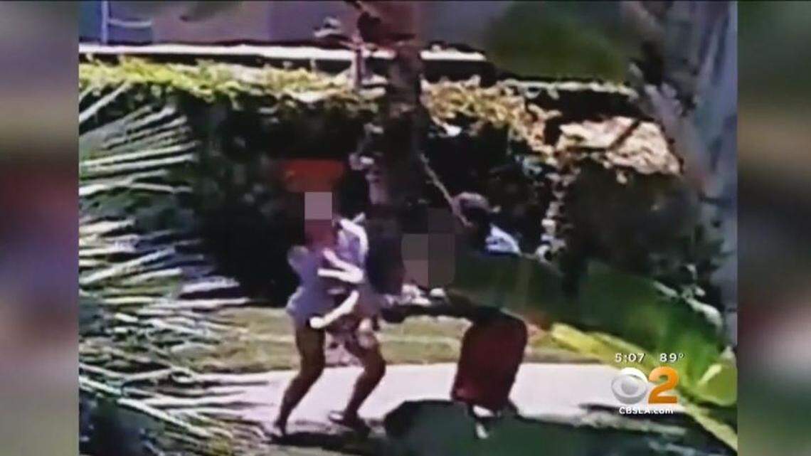 A man swings his 18-month-old son around his head “like a baseball bat,” striking a woman with him, in a security video captured Thursday in Riverside, California, according to police, KCBS reported.