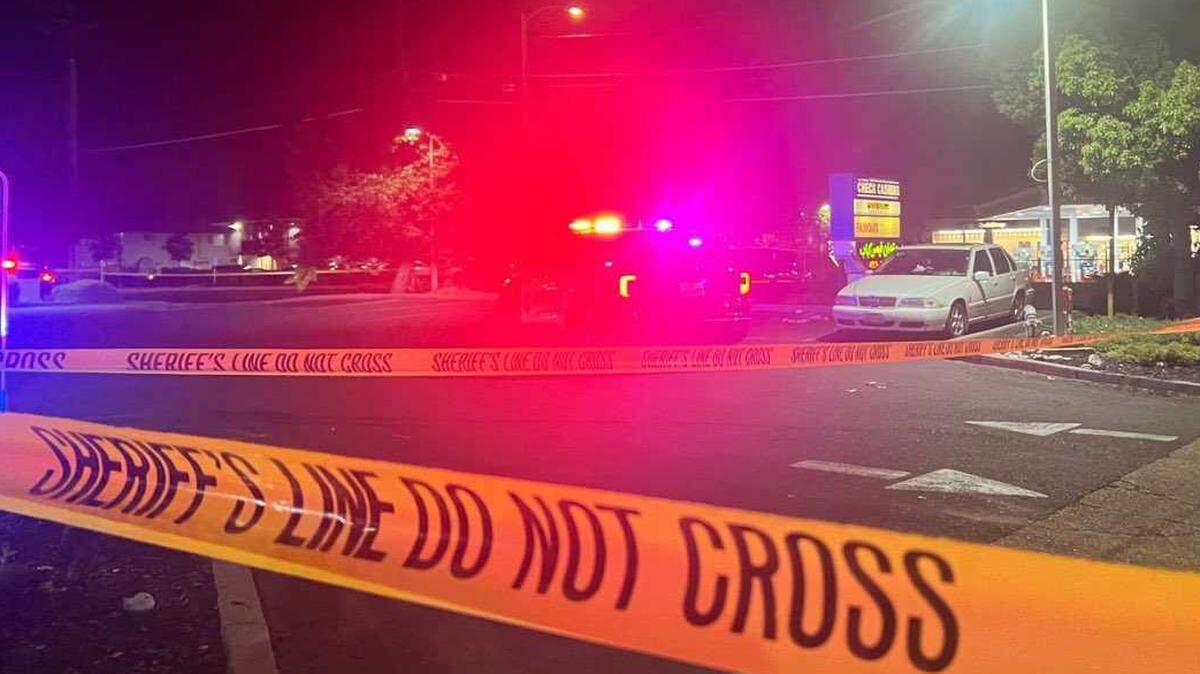 Police tape blocks off Hurley Way and Fulton Avenue following a shooting outside a 7-Eleven in Arden Arcade on Sunday, June 9, 2024. One man died from a gunshot wound at the hospital.