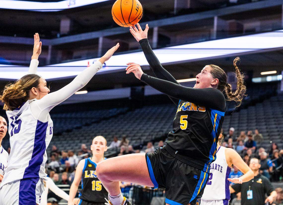 Faith Christian Lions guard Lauren Harris (5) shoots against the Bret Harte Bullfrogs in the CiF Sac-Joaquin Section Division V girls basketball championship at Golden 1 Center on Saturday.