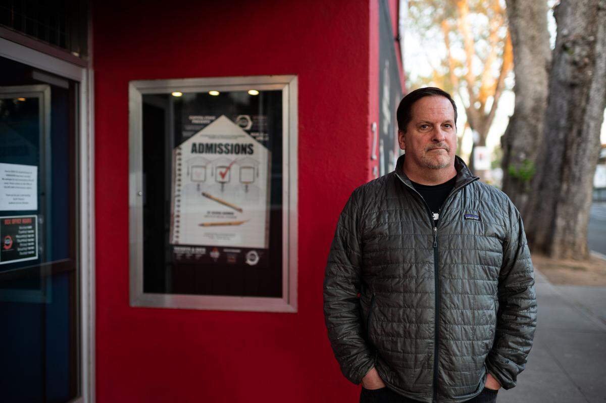 Capital Stage producing artistic director Michael Stevenson stands outside the box office April 11 on J Street in midtown where people used to gather ahead of showtimes.