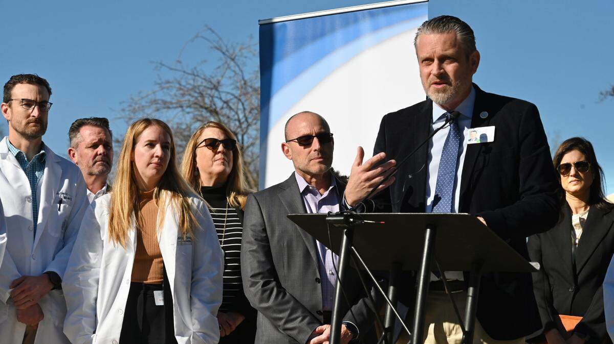 WellSpace CEO Jonathan Porteus, standing at podium, said his organization is working with UC Davis Health to identify specialists who are passionate about ensuring that people at all income levels can get access to quality care.