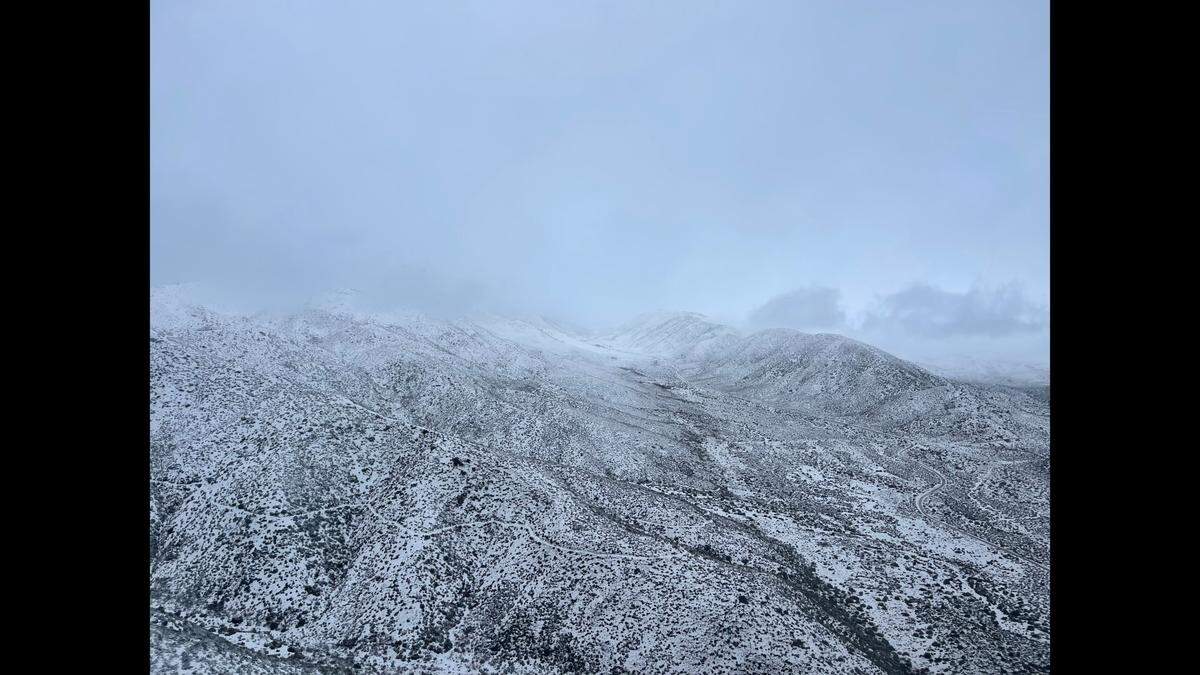 A man stranded in the snow while off-roading was rescued  after sending a text message to his girlfriend, a California sheriff said.&nbsp;