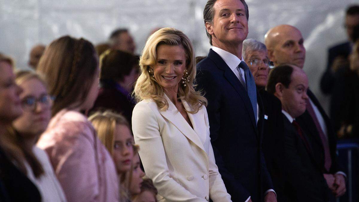 Governor Gavin Newsom and First Partner Jennifer Siebel Newsom look around during the inauguration at the state Capitol on Monday, Jan. 7, 2019 in Sacramento.
 
