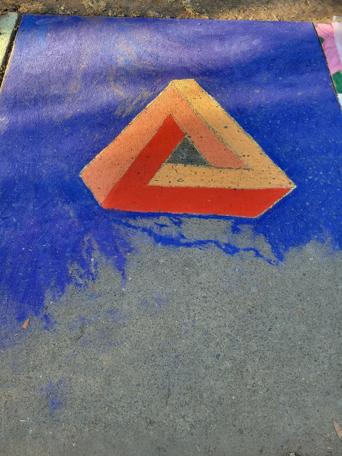 Ileana Naihe’s chalk creation sits on the sidewalk at the Chalk It Up festival on Sunday, Sept. 4, 2022.