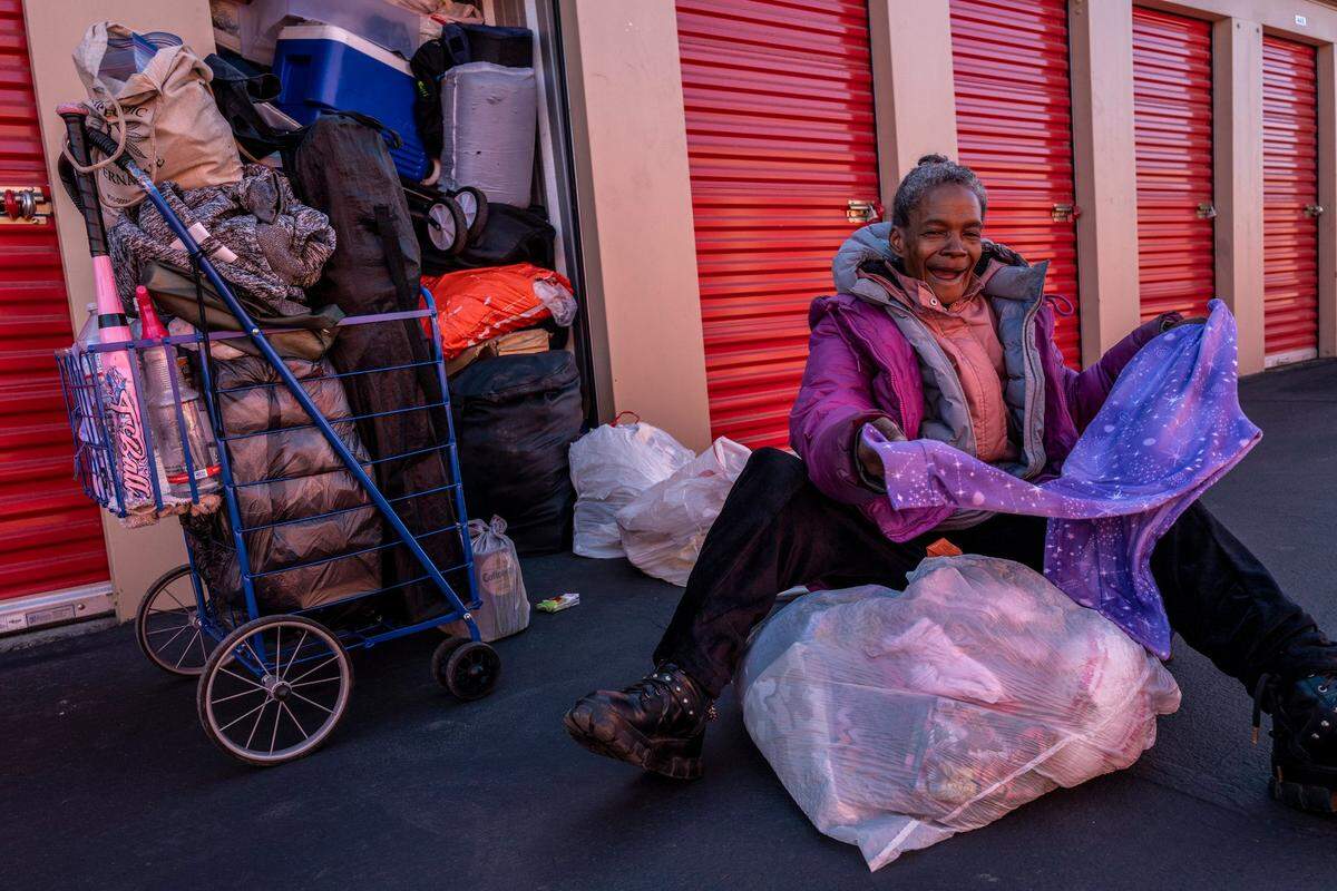 Sharon Pendarvis is happy to find a warm pair of fleece pants to wear at her storage unit in Sacramento in November. After being kicked out of Sacramento Self-Help Housing, she had to rent the monthly space. “I felt like I was in a very abusive situation and everything they were going through in their lives they were taking out on me,” said Pendarvis about the tenants she was living with at the group home.