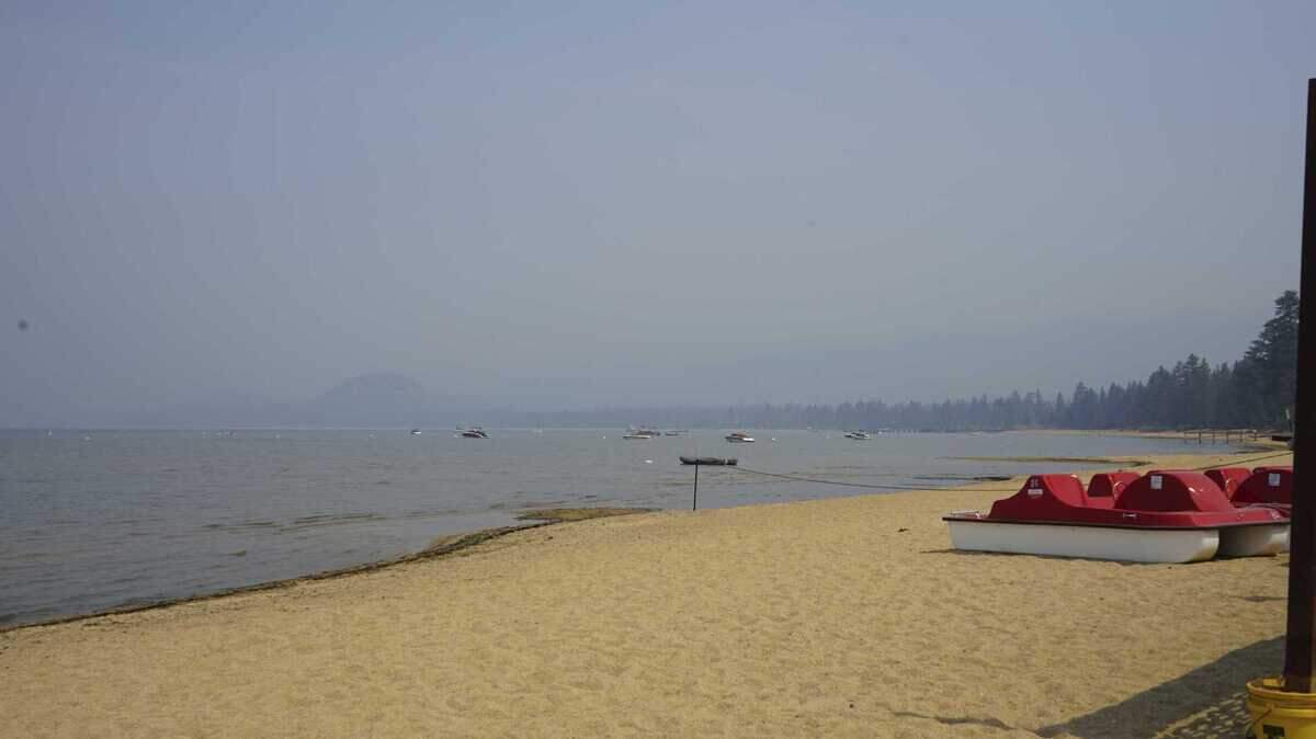Smoke shrouds parts of Lake Tahoe visible from Ski Run Marina in downtown South Lake Tahoe, Calif., Monday, Sept. 6, 2021. Smoke from the Caldor Fire is still being carried by wind across the Sacramento region.