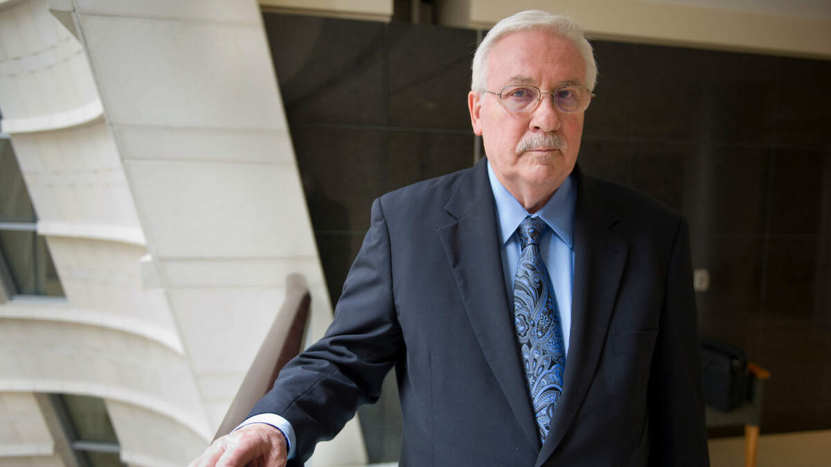 Sacramento attorney John Virga is photographed at the Sacramento federal courthouse in 2013. Virga, a longtime Sacramento defense attorney considered a giant in the legal community, died July 14, 2023. He was 84.