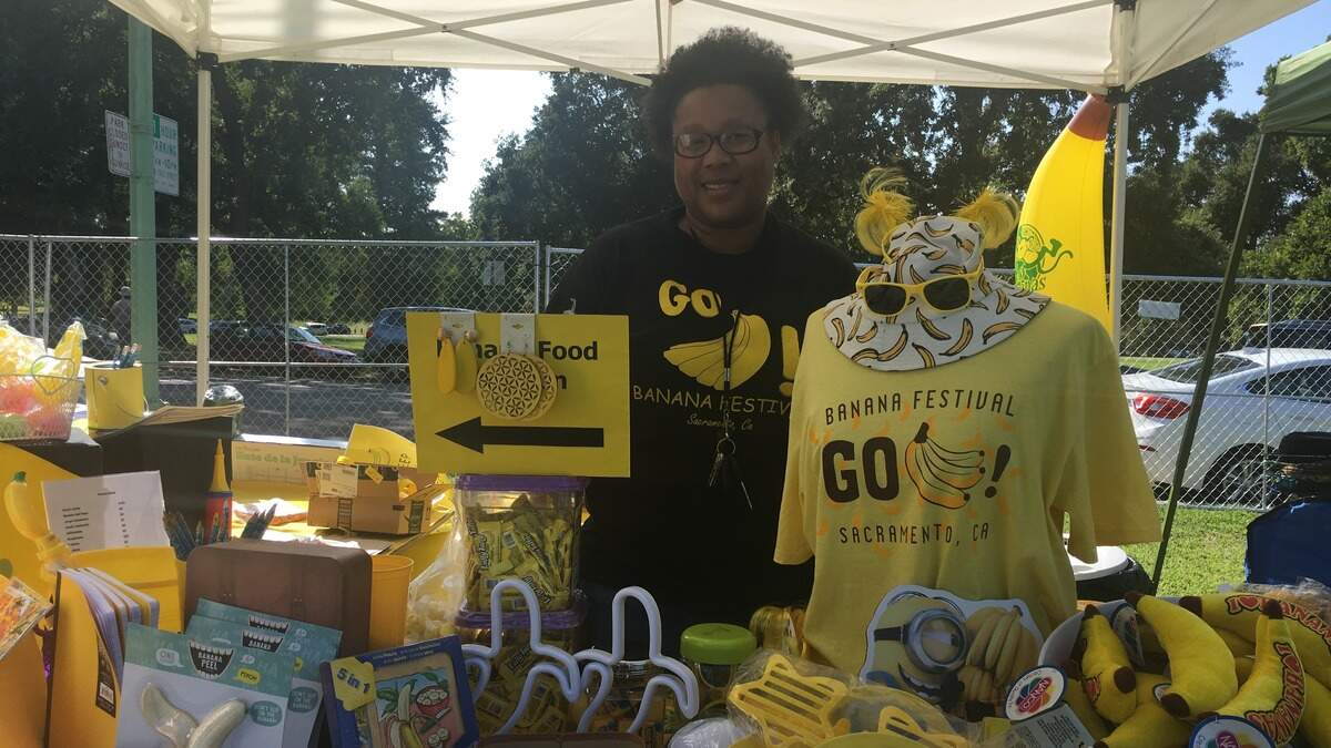 Banana Festival volunteer coordinator Daphne Burgess poses at the Banana Store booth Saturday at William Land Park.
