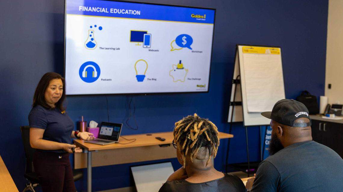 Barbara Quan, Golden 1 Credit Union’s manager of financial education, leads a free financial education workshop in the Financial Resource Center’s community room in Del Paso Height.