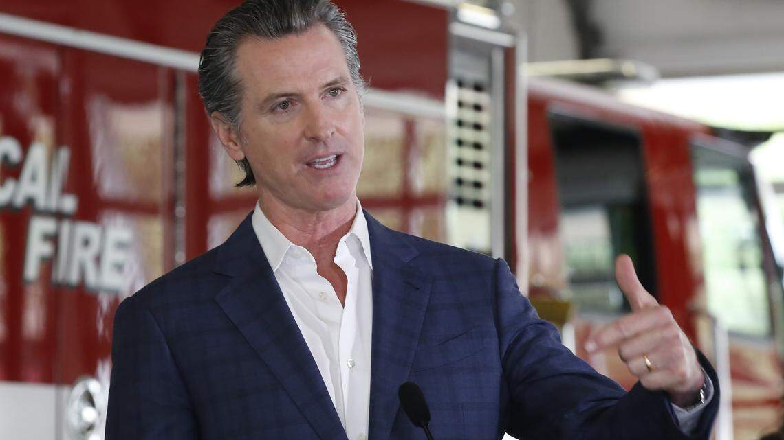 Gov. Gavin Newsom discusses his revised state budget proposal during a news conference at the CalFire/Cameron Park Fire Station in Cameron Park, Wednesday, May 13, 2020.