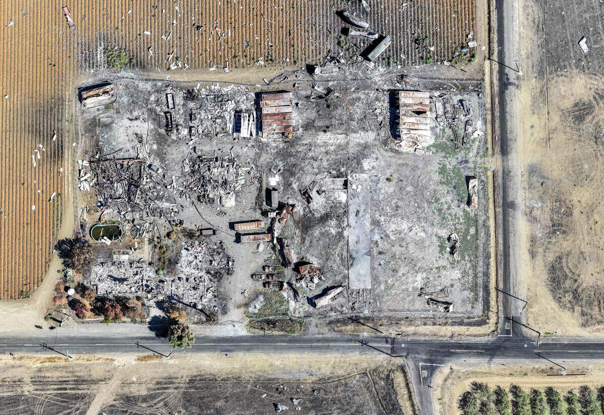 A composite image of drone photographs taken on Sept. 11, 2025, shows the remains of the Esparto fireworks explosion site a few months after the blast killed seven workers at the facility.