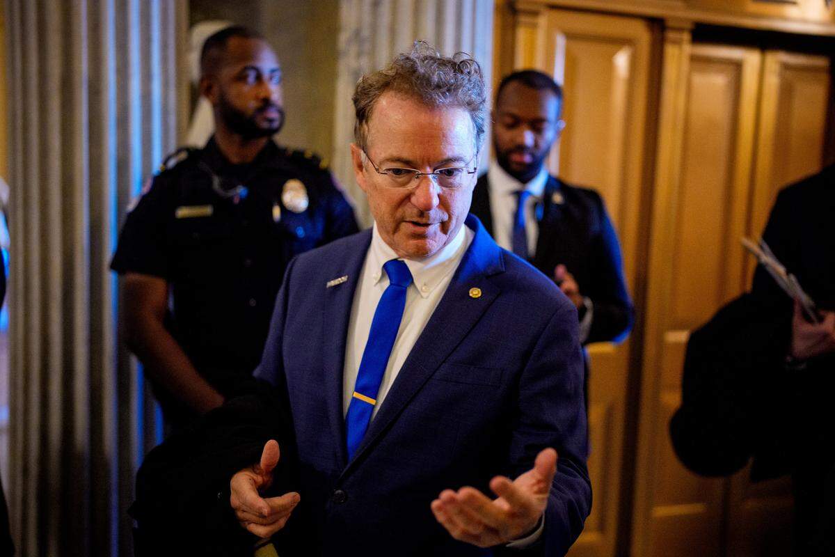 Sen. Rand Paul, R-Ky., walks into the Senate Chamber on Thursday in Washington, D.C. Two opposing health care bills intended to avert rising health care premiums failed in the chamber. 