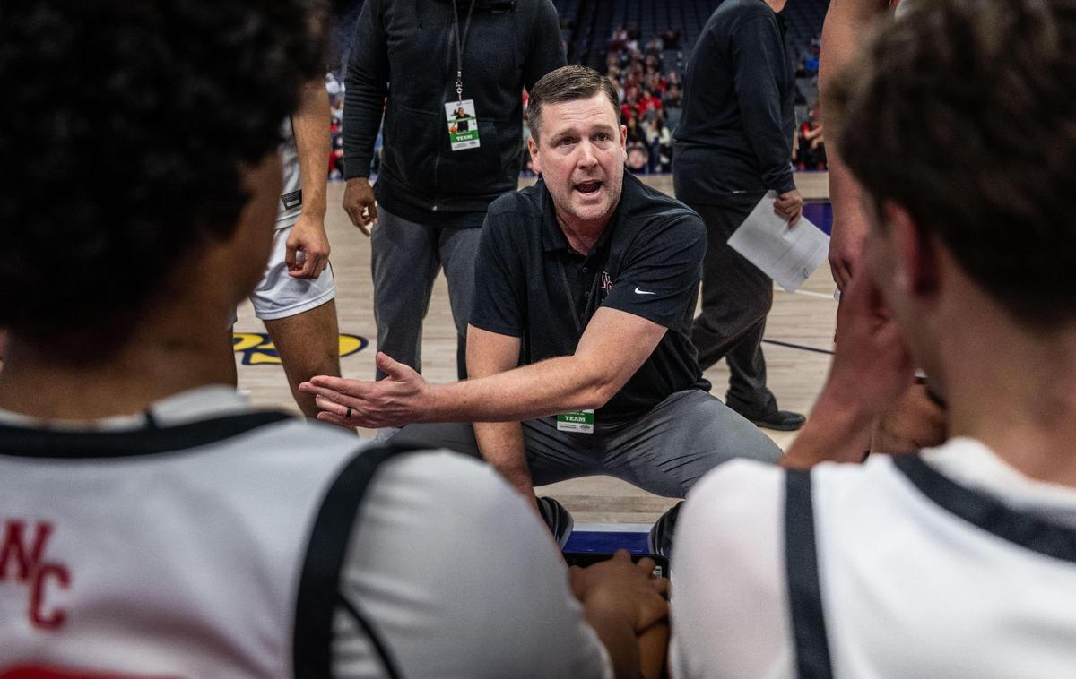 Woodland Christian coach Casey Neimeyer talks to players during a CIF Sac-Joaquin Section Division V boys basketball championship game against Argonaut at Golden 1 Center on Friday, Feb. 28, 2025.