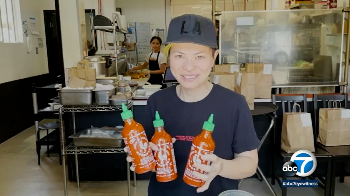 Bé Ù, a Vietnamese takeout spot in Los Angeles, is offering free banh mi, popcorn chicken or an order of summer rolls in exchange for a 28-ounce bottle of Huy Fong Foods’ Sriracha. (Screenshot from ABC7 News)