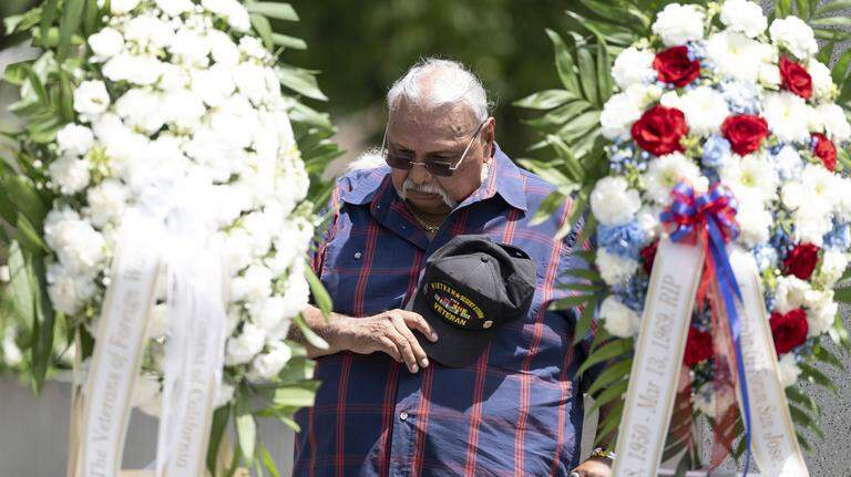 Week in photos: Remembering those we lost + river play + election nears + baseball